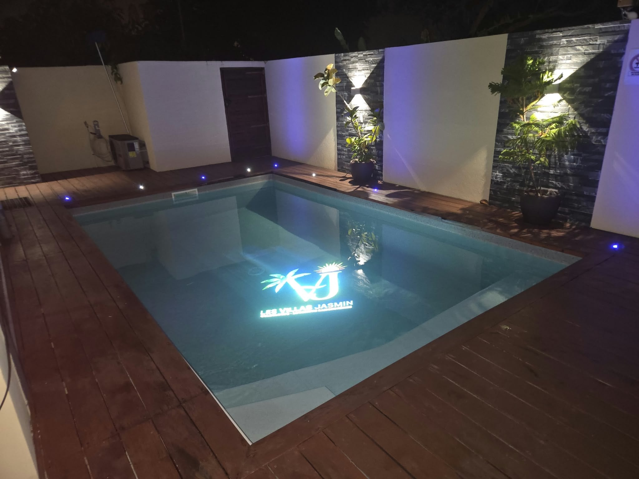 The pool and the pergola in the evening